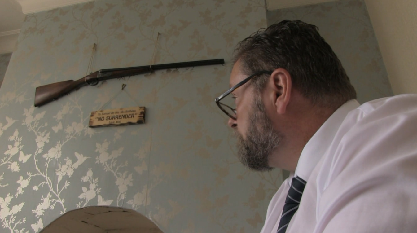 Still from and link to 'The Gun Hanging on the Wall'.